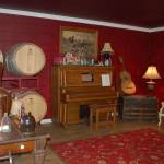 The tasting room at Evil Roys Distillery held a soft opening in June and boasts a Western and Victorian interior. Sequim Gazette photo by Erin Hawkins