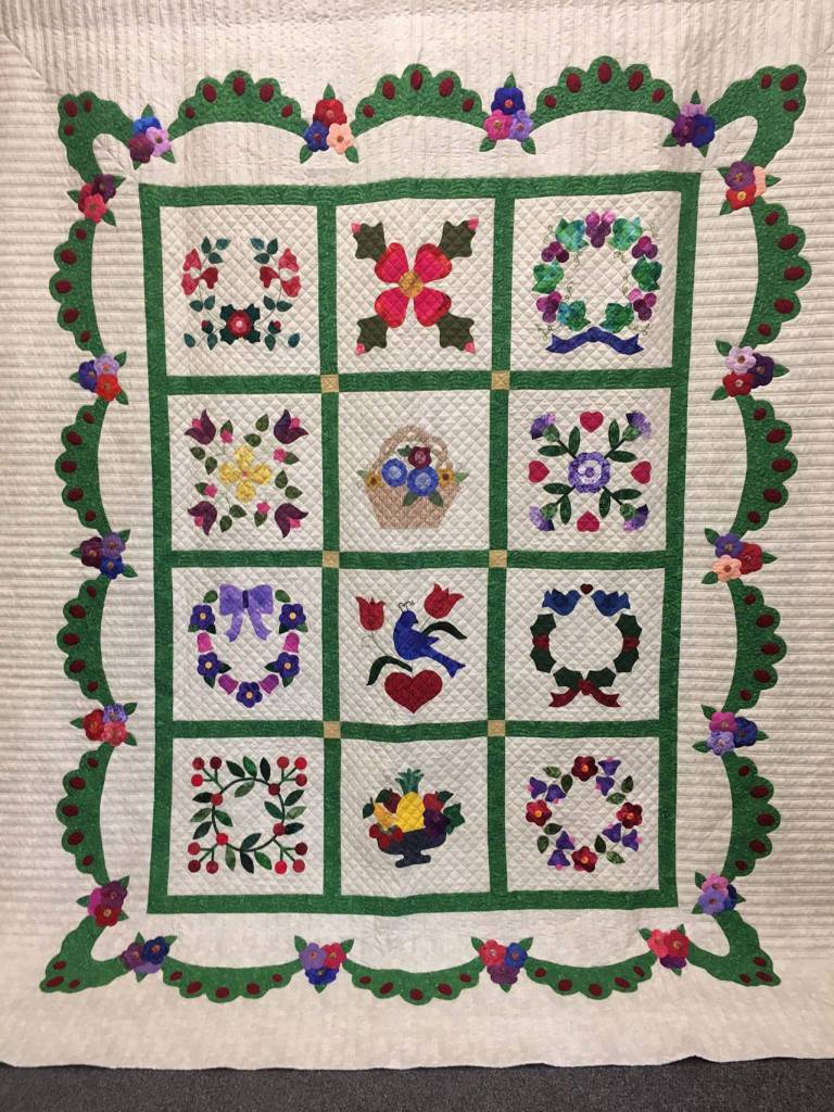 This years Sunbonnet Sue Quilt Club raffle quilt In Bloom! can be seen July 20-22 at Sequim Middle School. It features designs by Eleanor Burns with hand applique and machine quilting by Barbara McArthur, Jan Bartlett, Loretta Bilow, Diane Davis, Nancy Davis, Linda Huggins, Shirley Lehman, Jaydee Price, Ilse Osier, Martha Scott, Nancy Wilcox and Alana Levesque. Tickets are $1 each.