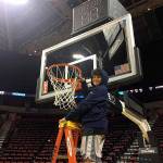 Saul Williams cuts down a net after he and fellow Boys & Girls Club campers enjoyed a Seattle Storm basketball game last week. Submitted photo