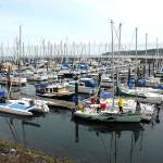 Boats sit moored at John Wayne Marina near Sequim earlier this year. (Keith Thorpe/Peninsula Daily News)