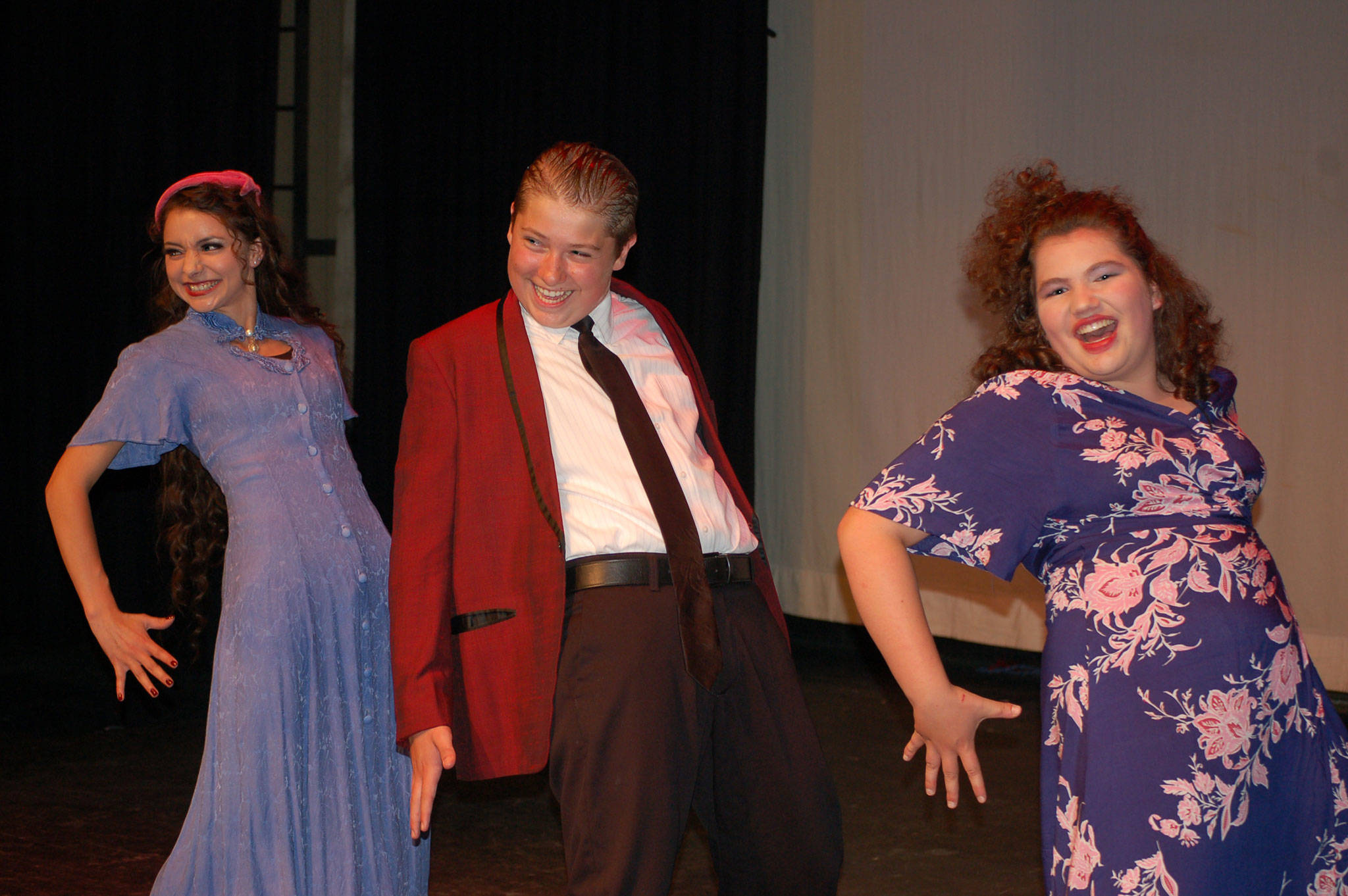 Ghostlight Productions presents Annie Jr. full with a cast of local students from Port Angeles and Sequim. Villains Lily St. Regis (played by Klarissa Keller), Rooster Hannigan (Brock Kluver) and Miss Hannigan (Avery Saul) rehearse a singing and dance scene in the upcoming musical. Sequim Gazette photo by Erin Hawkins