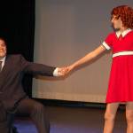 Students Caleb DeMott cast as Oliver Warbucks and Danika Chen playing the role of Annie act out a scene from Ghostlight Productions upcoming show Annie Jr. Sequim Gazette photo by Erin Hawkins