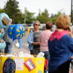 Philomena Lund talks with customers outside the Sequim Walmart during the annual Stuff the Bus event in 2017. Sequim Gazette file photo by Michael Dashiell