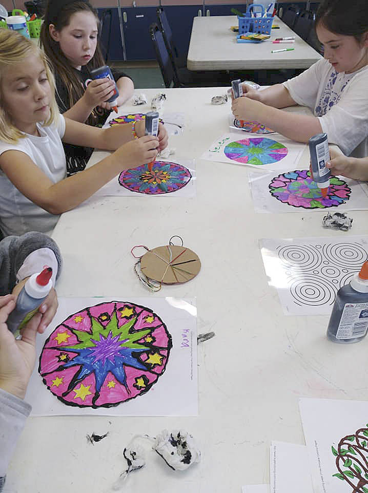 Campers work on stained glass art in the Boys & Girls Club art room. Submitted photo