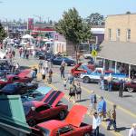 Community members peruse a variety of classic cars at the Sequim Prairie Nights event on Aug. 18.