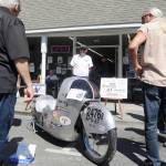 George McMurray of Sequim shows off his record-setting motorcycle at the Sequim Prairie Nights event on Aug. 18. McMurray vies for world records at the Bonneville Speed Week in Utah each August.