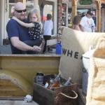 Paul Miller of Bremerton and his kids Bradley, 11, and Bridget, 4, get a look at Jeff and Billie Jo Jacksons 1966 Chevy Custom C-10 truck dubbed Skull Cracker. The Millers were visiting Sequim for the weekend. Sequim Gazette photo by Michael Dashiell
