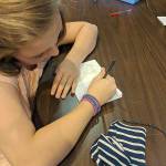 Inspired by the Diary Of A Wimpy Kid book series, a Boys & Girls Club morning camper works on her own diary. Submitted photo
