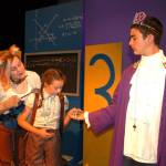 Olympic Theatre Arts comical show Phantom Tollbooth features more than 35 characters with many actors playing several parts. Amelie Mantchev, left, cast as Tock, with Kaylin Gauble, cast as Milo, and Ashton Drew as the Mathemagician, act out a scene from the upcoming production.