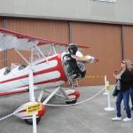 Sequim Air Affaire attendees get a good look at a 1943 Meyers OTW-160 bi-plane, a World War II-era civilian pilot training aircraft owned by Doug Platten of Port Angeles. Sequim Gazette photo by Michael Dashiell
