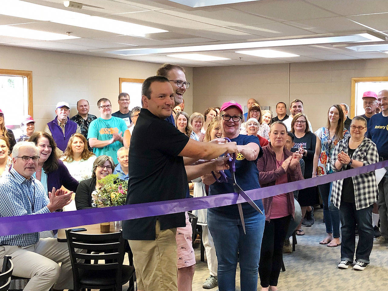 Sequim High School staff celebrate a revamp of the schools staff room on Aug. 28. Submitted photo
