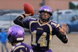 Football: Wolves overcome rain, Spartans thanks to Cowan’s big night, defense