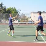 Sequims Liam Payne, left, and partner Damon Little celebrate a point as they earn a come-from-behind, three-set win over Port Angeles Brady Nickerson and Kyler Torbin in No. 1 doubles action on Sept. 6. Sequim Gazette photo by Michael Dashiell
