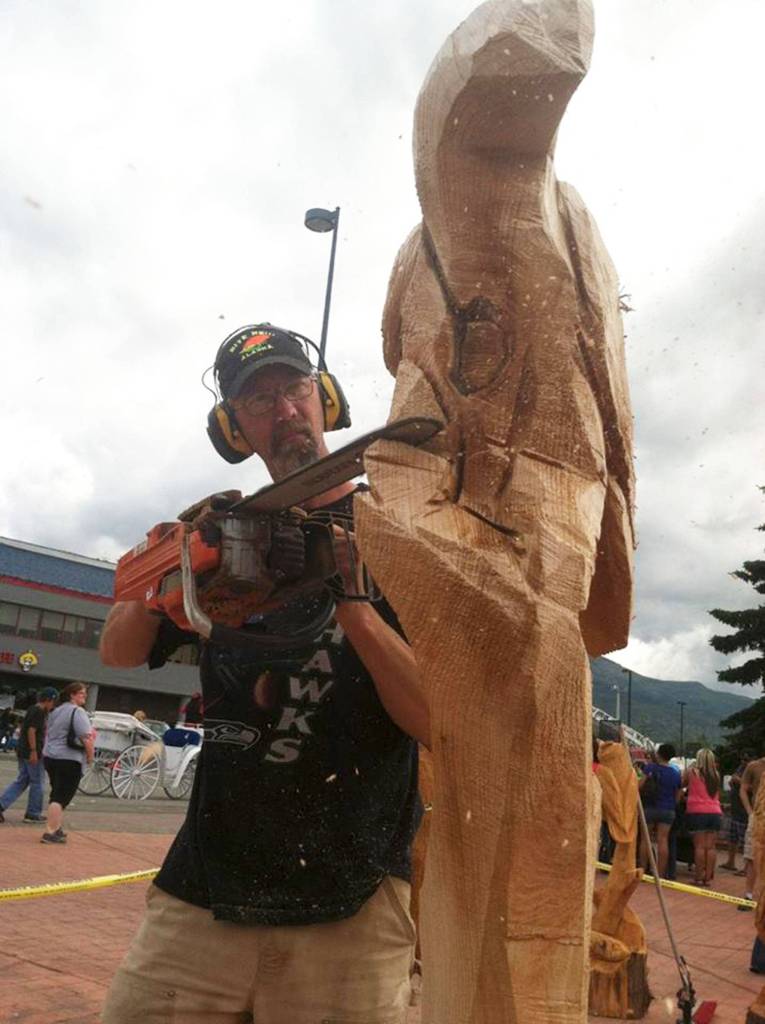Eric Berson sculpts wood carvings using a chainsaw. He said depending on the size of the piece, it can take anywhere from 20 minutes to several days to finish. Submitted photo