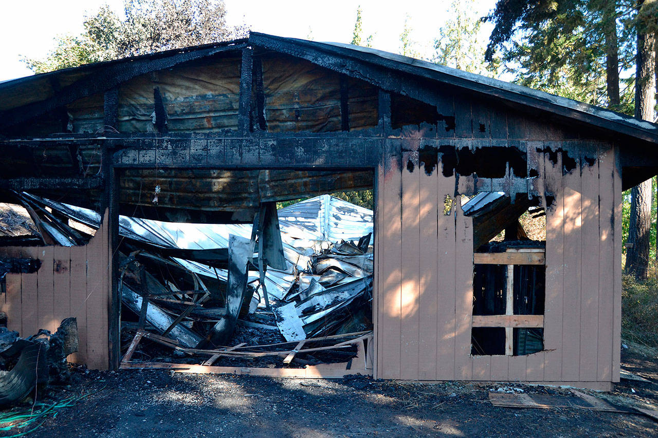 Staff with the Cedars at Dungeness estimate about 50 golf carts and other equipment were lost on Sunday, Sept. 16 in an early morning fire. No injuries were reported and the cause remains under investigation. Sequim Gazette photo by Matthew Nash