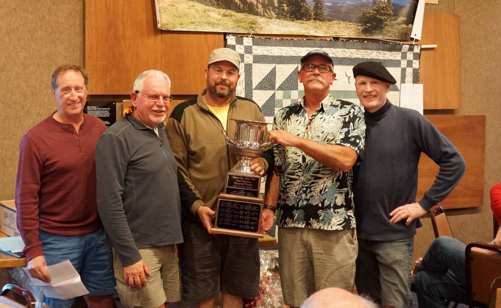 Celebrating a Division B win at the 2018 Reach for the Hospice on Sept. 15 is the crew of Malolo; skipper Alaan Clark is second from right. Submitted photo