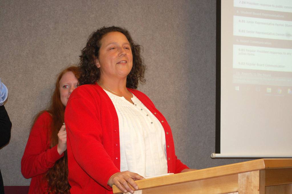 Elizabeth Joers, a paraeducator at Greywolf Elementary School and Sequim Association of Paraeducators president, spoke at the school board meeting on Sept. 17 and asked board members for equitable salary increases for equitable employees as the union remains in negotiations with Sequim School District. Sequim Gazette photo by Erin Hawkins                                Elizabeth Joers, a paraeducator at Greywolf Elementary School and Sequim Association of Paraeducators president, spoke at the school board meeting on Sept. 17 and asked board members for equitable salary increases for equitable employees as the union remains in negotiations with Sequim School District. Sequim Gazette photo by Erin Hawkins