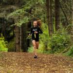 Sequim freshman Riley Pyeatt builds a commanding lead less that halfway through the Oct. 4 league meet against Olympic and Port Townsend. Pyeatt helped the Wolves notch their first league victories last week at SHSs home course at Robin Hill County Park. Sequim Gazette photo by Michael Dashiell