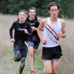 Sequims Jakob Pyeatt, left, and Fischer Jensen, make their way up meadow hill at Robin Hill County Park on Oct. 4. Jensen was fifth and Pyeatt seventh as the Wolves swept Olympic and Port Townsend. Sequim Gazette photo by Michael Dashiell