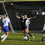 Sequim defender Yana Hoesel (3) clears the ball from deep in Wolves territory and negates a Bremerton scoring chance late in the first half of Sequims 3-0 win over the Knights. SHSs Mary McAleer (5) looks on. Sequim Gazette photo by Michael Dashiell