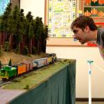 During the Clallam County Fair in August, Sequims Billy Edwards inspects the North Olympic Peninsula Railroaders HO-scale display saying, This thing is so sweet. It has so much detail. The club hosts its 19th show at the fairgrounds on Oct. 13-14. Sequim Gazette file photo by Matthew Nash