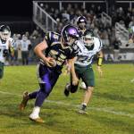 Sequim lineman Brandon Barnett looks for running room after picking off an errant throw from Port Angeles quarterback Brenden Roloson-Hines in the Wolves 46-6 rout on Oct. 12. Sequim Gazette photo by Matthew Nash