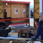 Isabelle Dunlop, a produce volunteer at the Sequim Food Bank, said vandals have taken bites out of donated produce and spit it back in boxes and torn trim down from the produce barn at least twice in recent weeks. Gas and other needed equipment was also stolen. Sequim Gazette photo by Matthew Nash