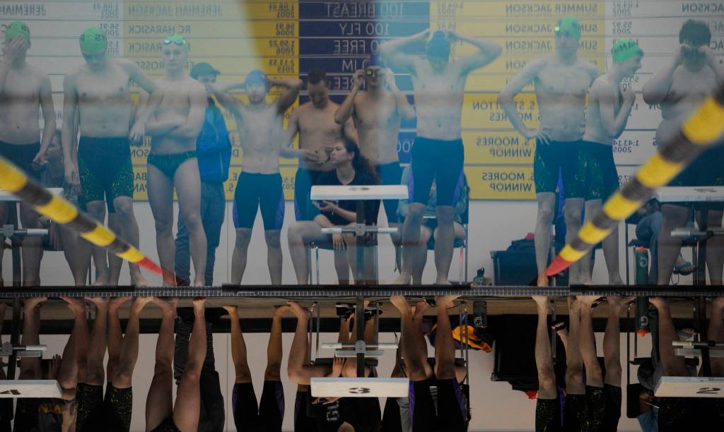 Calm Before the Storm, a photo of Sequim High School swimmers in a meet against rivals from Port Angeles in January 2017, took second place in the 2018 WNPA Better Newspaper Contests Photography-Color Sports-Feature division. Sequim Gazette photo by Michael Dashiell