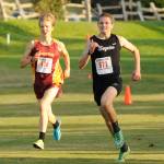 Sequims Murray Bingham, right, speeds past Kingstons Stefan Lusis for the 2018 Olympic League individual title on Oct. 18 in Port Townsend. Sequim Gazette photo by Michael Dashiell