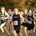 Sequim senior Liam Byrne, center, races to a 10th-place finish at the 2018 Olympic League meet last week in Port Townsend. Sequim Gazette photo by Michael Dashiell