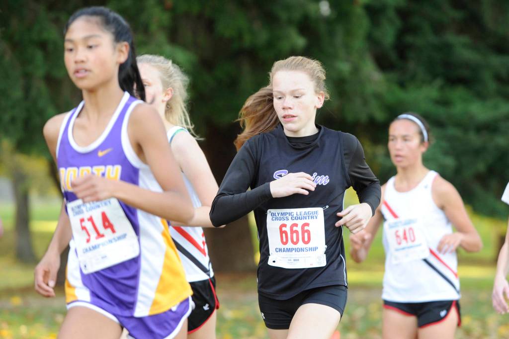 Sequim freshman Riley Pyeatt, center, races with the lead pack early at the 2018 Olympic League cross country meet in Port Townsend last week. Pyeatt finished fifth overall. Sequim Gazette photo by Michael Dashiell