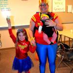 Sequim Wonder Women Piper, Laila, and mom Rebekah Jackson strike a super pose at Haunted Hallways in 2017. The event continues this year from 1-4 p.m. Saturday, Oct. 27. Sequim Gazette file photo by Matthew Nash