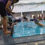 Freshman Melanie Byrne finishes a race on Oct. 18 in the final home meet of the season for the Wolves.