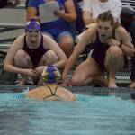Heidi Schmitt and Madeline Patterson cheer for Natalie George during the 200 individual medley.