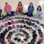 Girl scouts kick start shoe drive: Girl Scout Troop brings in 130 pairs for Clallam foster children