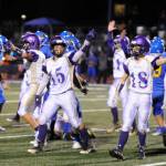 Sequims Taig Wiker (15) and Jarrett Allen let Sequim fans know they recovered a fumble in the Wolves 41-21 road win on Oct. 26, locking up a 6-0 record in Olympic League play. The Wolves open the postseason Nov. 2 against Franklin Pierce in Silverdale. Sequim Gazette photo by Michael Dashiell