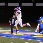 Sequim receiver Michael Young leaps and snags a 29-yard TD pass from Riley Cowan in the Wolves league win at Bremerton on Oct. 26. Young had seven catches for 136 yards and two scores in the win. Sequim Gazette photo by Michael Dashiell