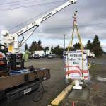 Clallam County crews install a new ballot box in Carlsborg by Sunny Farms. Photo courtesy of Jim Steeby