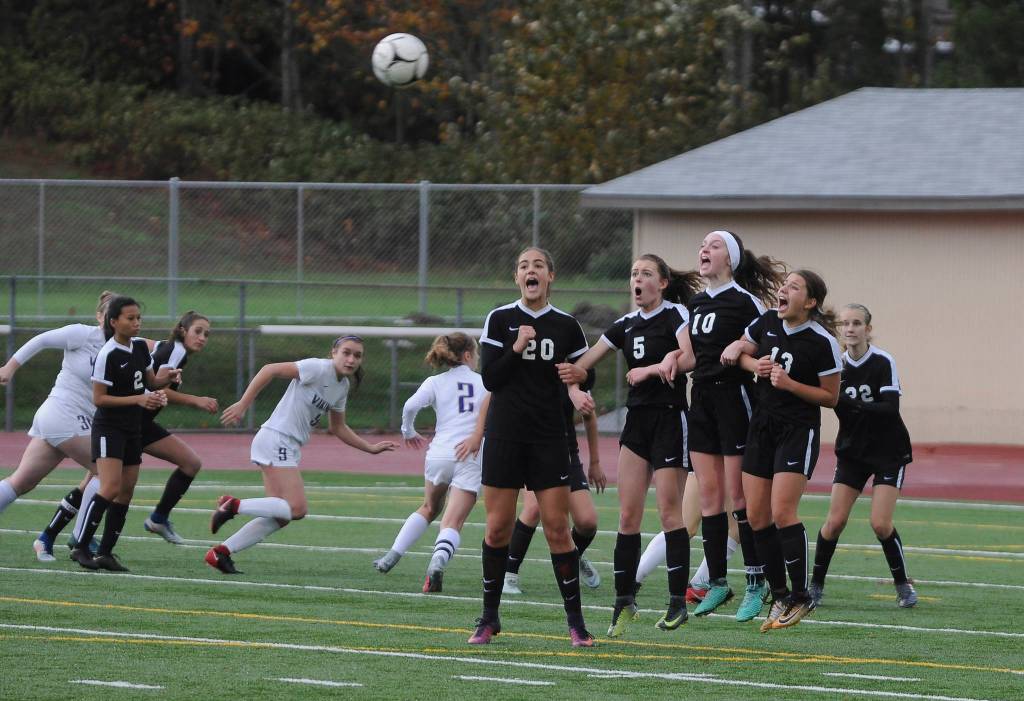 Sequim players (from left) Hope Glasser, Mary McAleer, Gretchen Happe, Natalya James and Hannah Wagner look to deflect a North Kitsap shot late in the Wolves 1-0 win in the West Central District championship game on Nov. 3 in Silverdale. Sequim Gazette photo by Michael Dashiell