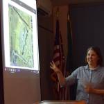 Meggan Uecker of the Clallam County Public Works Department presents to Sequim school board members on Nov. 5 in a workshop about what it would look like for Greywolf Elementary School to hook up to the Carlsborg Sewer Project. Sequim Gazette photo by Erin Hawkins