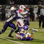 Sequims Johnnie Young, left, and Walker Ward (22) wrap up Steilacoom running back Jaymason Willingham. Sequim Gazette photo by Michael Dashiell