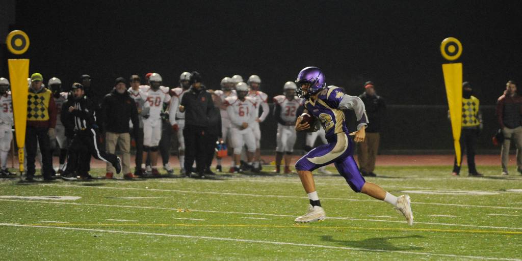 Sequim tight end Hayden Eaton breaks free for a 79-yard reception to set up one of Sequims two touchdowns in a 49-12 loss to Steilacoom in the first round of the class 2A state tournament Nov. 9 in Silverdale. Sequim Gazette photo by Michael Dashiell