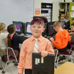 At 8-years-old, Port Angeles Aiden Johnson continues to build computers for people in-need with the Sequim PC Users Group. Through the groups help, he also helped start Roosevelt Elementary Schools Computer Club. Sequim Gazette photo by Matthew Nash