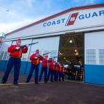 Members of the Mount Olympus Detachement of the Marine Corps League fire a 21-gun salute at the conclusion of the Veterans Day ceremony at U.S. Coast Guard Air Station/Sector Field Office Port Angeles on Sunday. (Jesse Major/Peninsula Daily News)