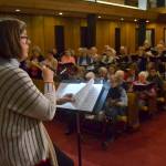 After leading choruses in the Netherlands, Louise Pluymen now directs the Sequim Community Christmas Chorus after living here about two years. Sequim Gazette photo by Matthew Nash