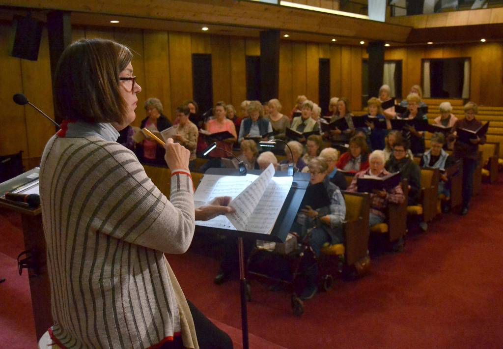 After leading choruses in the Netherlands, Louise Pluymen now directs the Sequim Community Christmas Chorus after living here about two years. Sequim Gazette photo by Matthew Nash