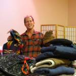 Steve Ford, co-owner of Drennan & Ford Funeral Home and Crematory, displays the hundreds of pieces of cold-weather clothing donated by Clallam County residents as part of the Drennan & Ford Funeral Homes recent Sweaters for Veterans collection drive. The cold weather clothing will be distributed by Voices for Veterans and local veteran groups to area veterans in need of such clothing during the winter months. This is the firms ninth year organizing this project, part of its many annual and ongoing projects to assist veterans and active duty service personnel. For more information about Sweaters for Veterans, call 360-457-1210 or email to steve@drennanford.com. Submitted photo