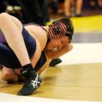 Above, Sequims Jacob Pyeatt closes in on a first-round pin of Bremertons Chris Lane in the All-Comers tournament in January. Pyeatt is the lone returning upperclassman for the SHS boys wrestling program this season. Right, Sequims Amaran Sauiluma works for a pin late against North Masons Josh Raymond in the 185-pound weight division at the All-Comers prep wrestling tournament in Sequim during the 2017-2018 season. Sauiluma is one of just five returning boys wrestlers for the Wolves. Sequim Gazette file photos by Michael Dashiell