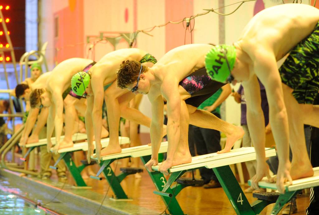Sequims Jax Thatxton prepares to break from the starting block in the 50 free event at Port Angerles on Dec. 13. Thaxton won the event and the 100 free. Sequim Gazette photo by Michael Dashiell