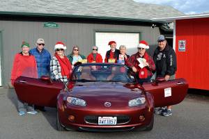 Miata club drives to support food bank, animals